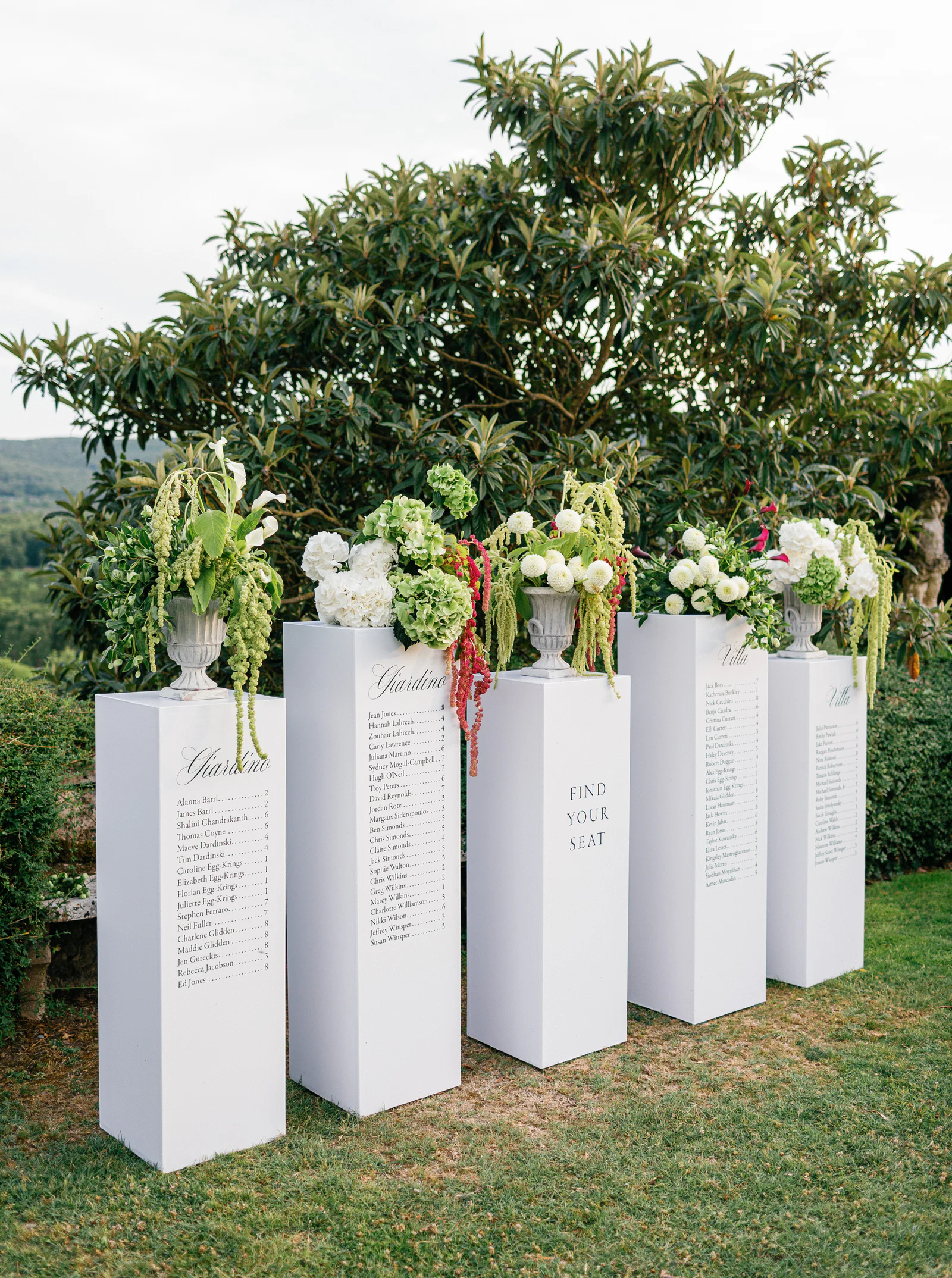 Seating plan on white plinths in the garden of Borgo Stomennano, Chianti, Tuscany