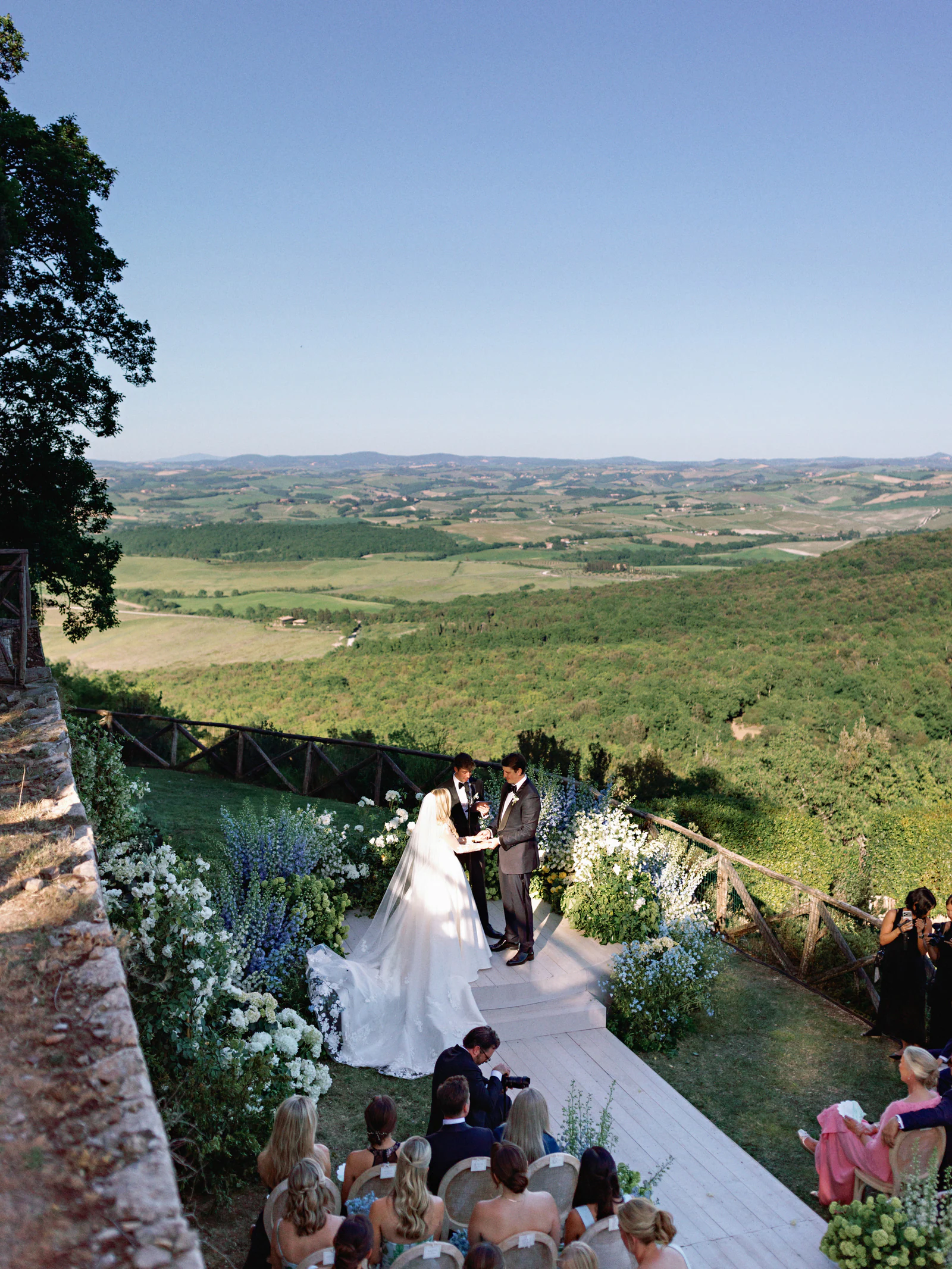 Ceremony seen from above, the aisle opening onto the Val d'Orcia at Castiglion del Bosco, A Rosewood Hotel, Tuscany