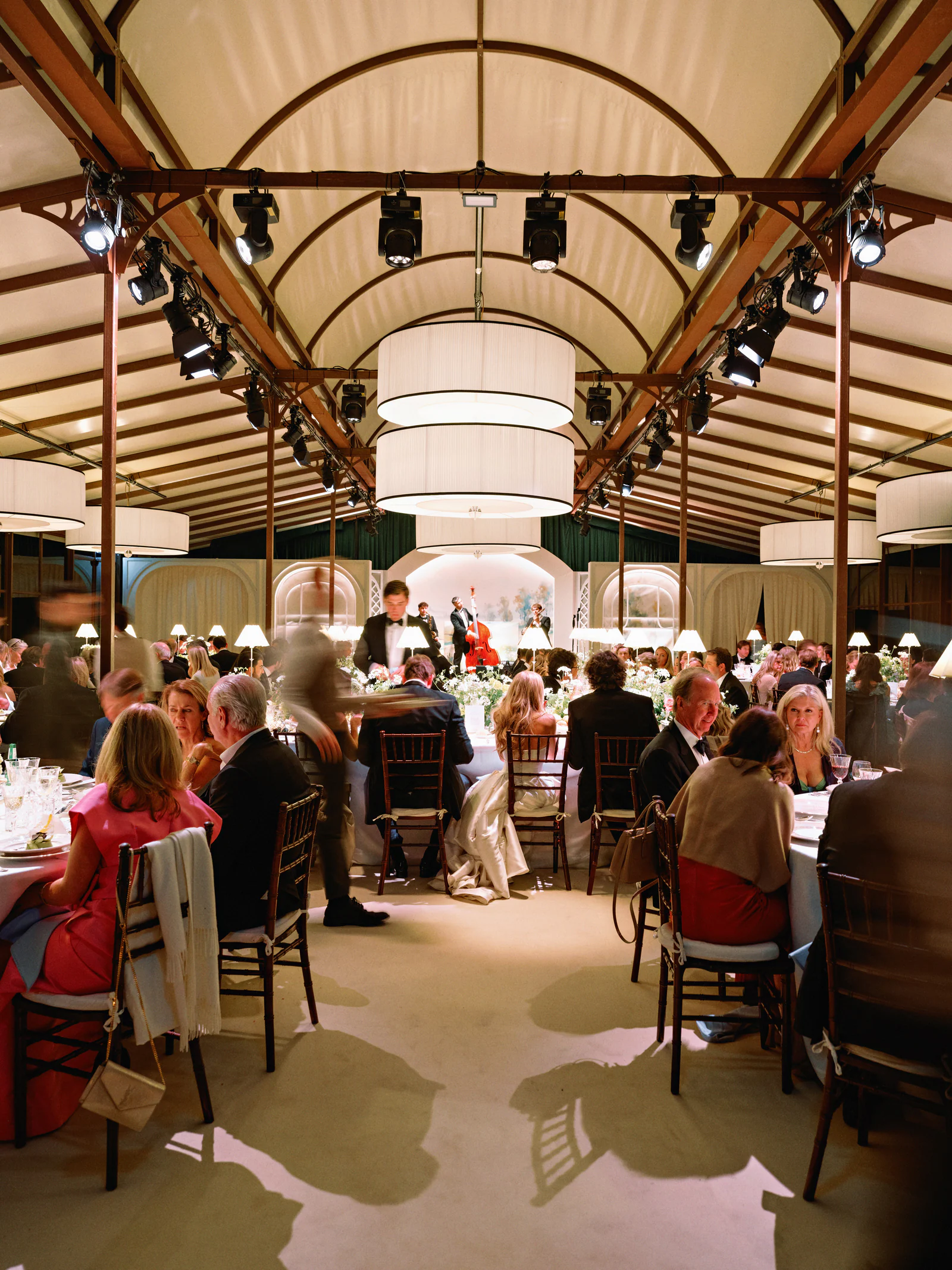 Wedding dinner under way in the glazed pavilion at night, Castiglion del Bosco, A Rosewood Hotel, Val d'Orcia